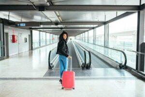 An airport traveler in Paris.