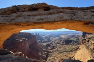 Before or after your raft trip do some hiking in Canyonlands National Park and check out Mesa Arch. Photo by Debbie Stone
