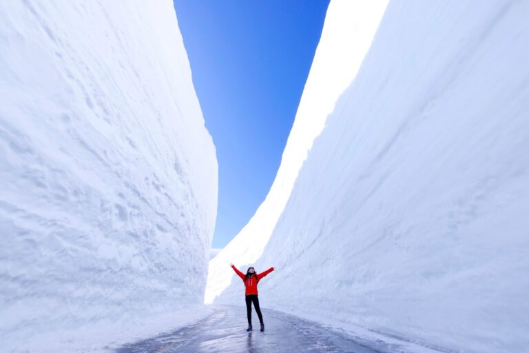 Person demonstrating the high of the snow.