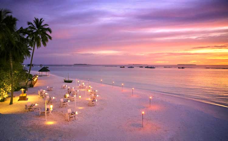 Sunset dining at Iru Fushi in the Maldives. Photo by Sun Siyam Resorts