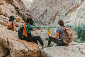 Women hiking in the desert together
