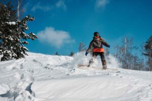 Women Skiing. Photo by Unsplash + in collaboration with Andrej Lišakov
